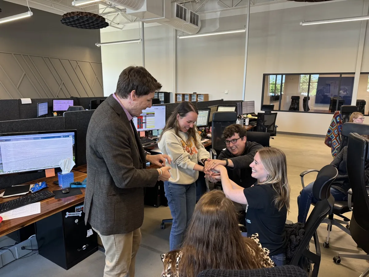 Michael Bloemeke performing mingling magic for a corporate team.