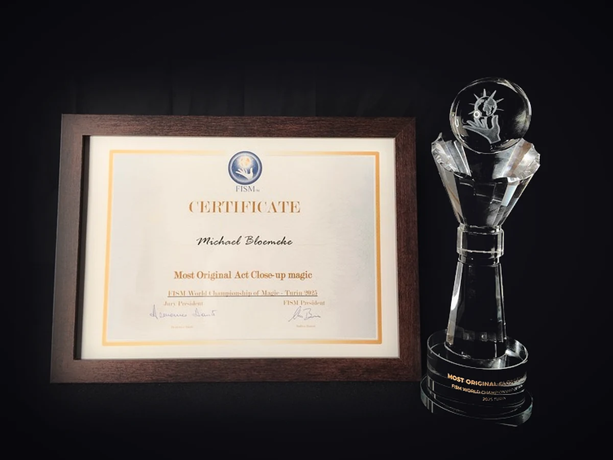 Michael Bloemeke's FISM 2025 Most Original Act certificate and crystal trophy from the World Championship of Magic in Turin, Italy.